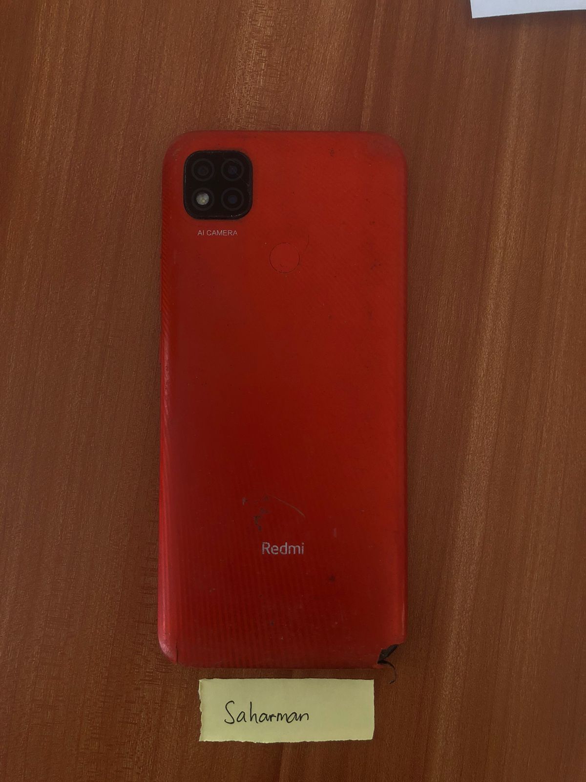 1 (satu) unit handphone Redmi 9C