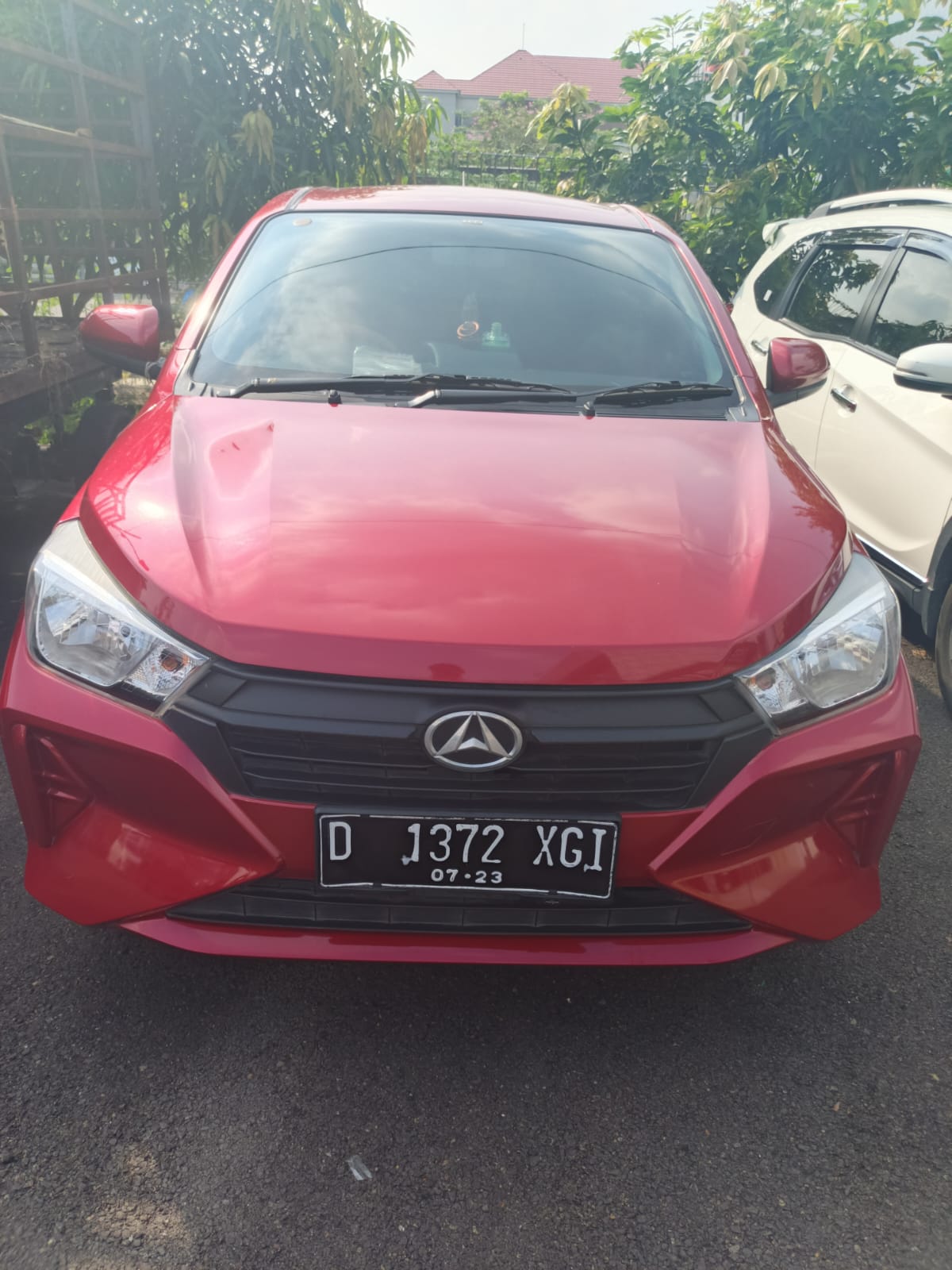 Mobil Daihatsu Ayla Warna Merah No.Pol.D-1372-XGI